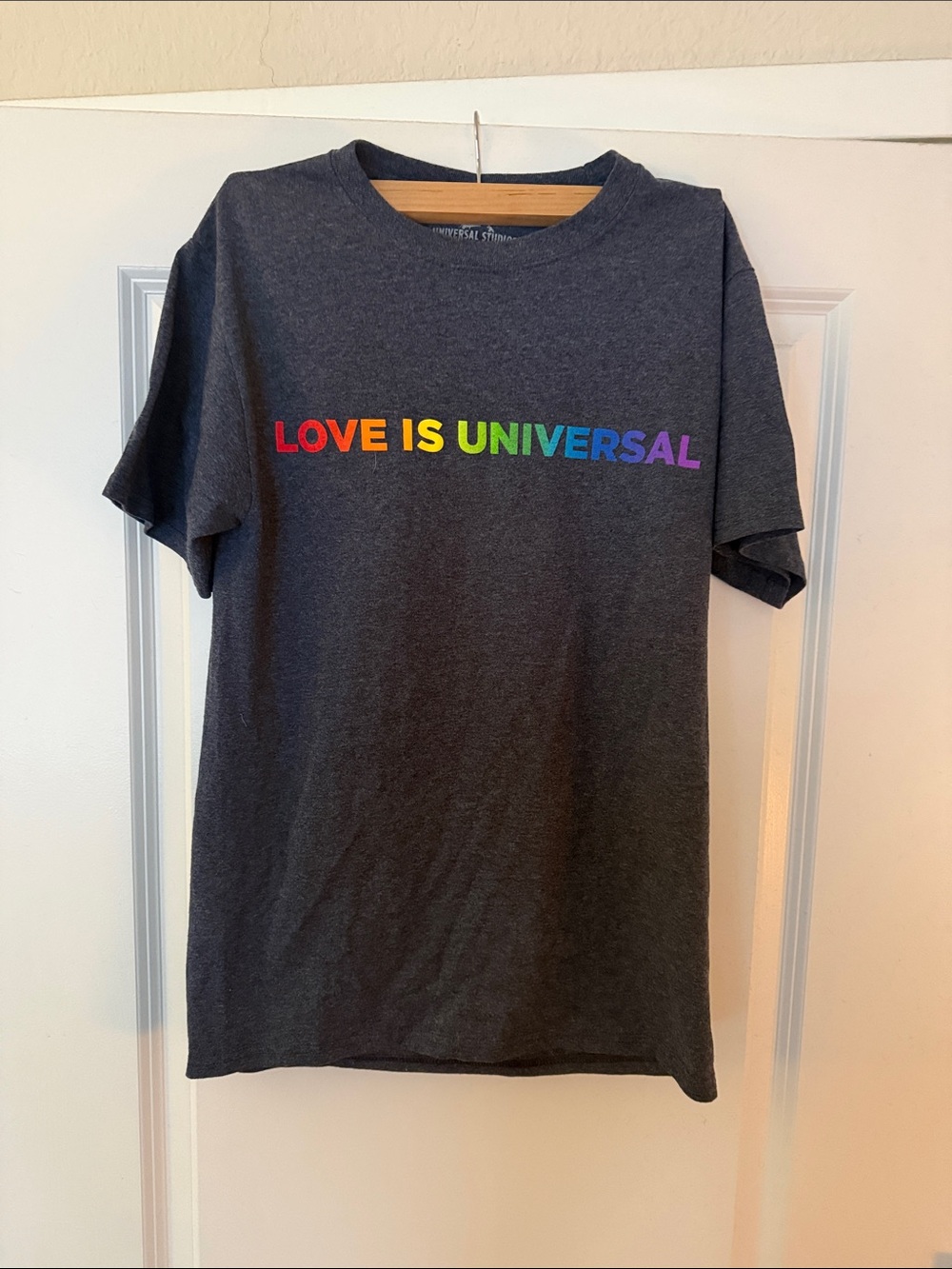 Universal Dark Gray Short-Sleeve Tee with Rainbow "Love Is Universal" Print